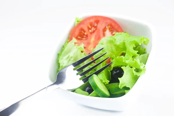 Fork,black olive,lettuce, tomato, cucumber and pepper in a bowl — Stock Photo, Image