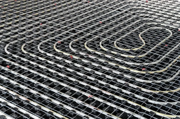 Calefacción por suelo radiante negro — Foto de Stock