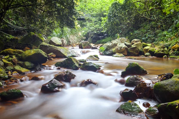 Fast flowing water in the mountain — Stock Photo, Image