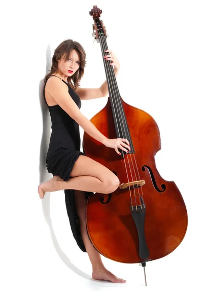 Woman in black dress play double bass — Stock Photo, Image