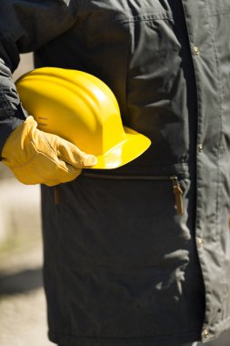 builder with yellow hard-hat clipart