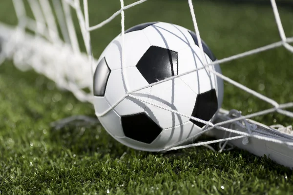 Soccer ball and goal net — Stock Photo, Image