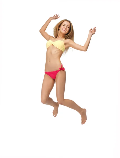 Obraz kobiety w bikini skoki — Zdjęcie stockowe