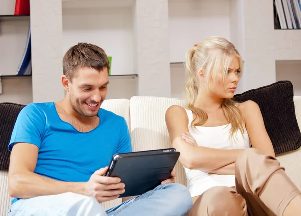 Couple with tablet PC Stock Photo