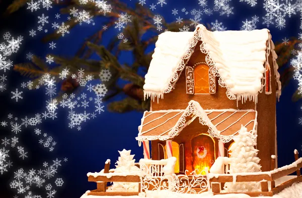 Gingerbread house over christmas background — Stock Photo, Image