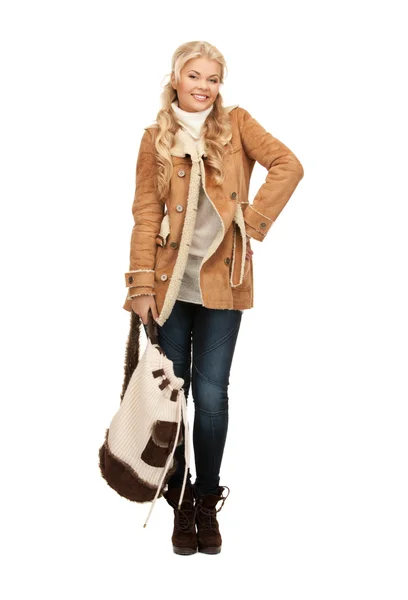 Woman in sheepskin jacket Royalty Free Stock Images