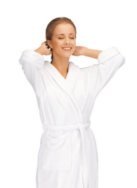 Beautiful woman in white bathrobe clipart