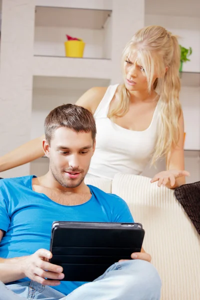 Couple with tablet PC Stock Image