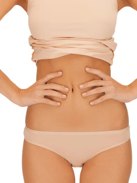 Ciało kobiety w beżowe bawełniane undrewear — Zdjęcie stockowe