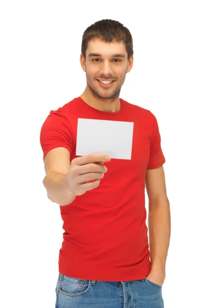 Homem bonito com cartão de nota — Fotografia de Stock