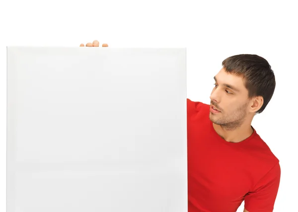英俊的男人用大空白板 — 图库照片