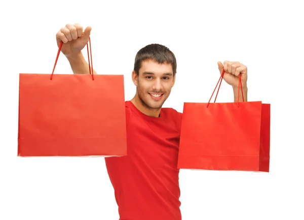 Hombre con bolsas de compras — Foto de Stock