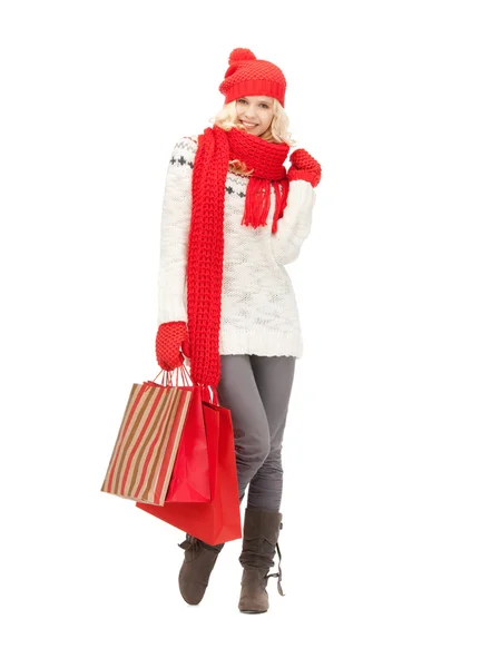 Mladá dívka s nákupními taškami — Stock fotografie