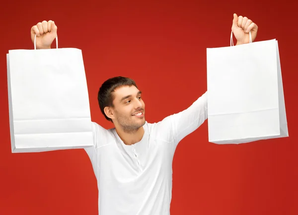 Hombre con bolsas de compras — Foto de Stock