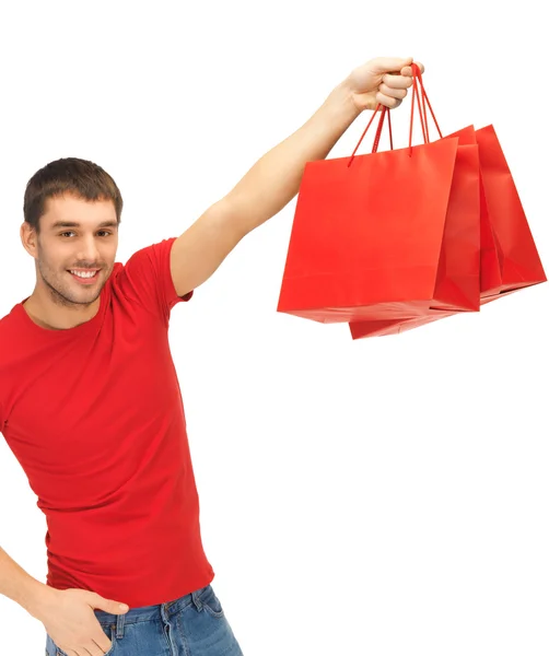 Homme avec des sacs à provisions — Photo