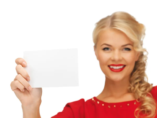Mulher encantadora em vestido vermelho com cartão de nota — Fotografia de Stock