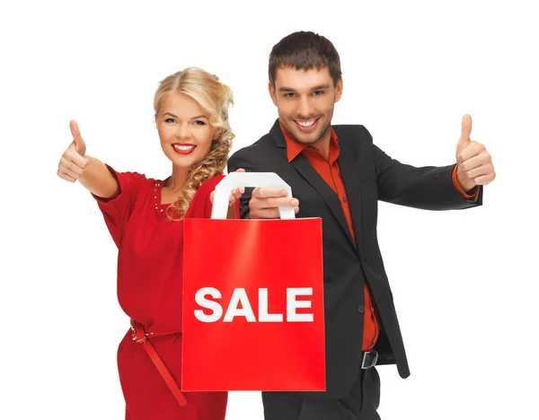 Uomo e donna con shopping bag — Foto Stock