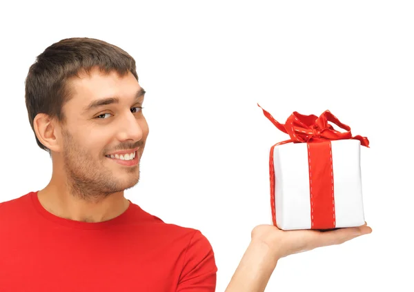 Handsome man with a gift — Stock Photo, Image