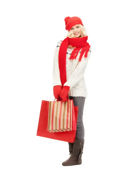 Junges Mädchen mit Einkaufstaschen — Stockfoto