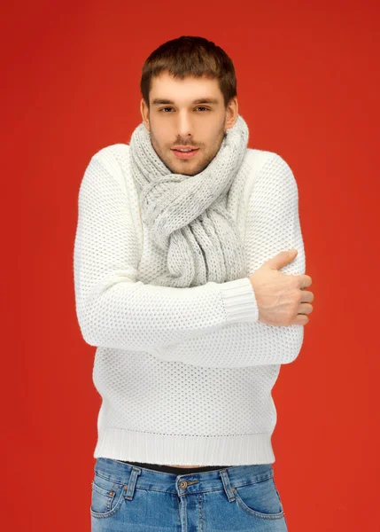 Handsome man in warm sweater and scarf — Stock Photo, Image