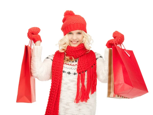 Mladá dívka s nákupními taškami — Stock fotografie