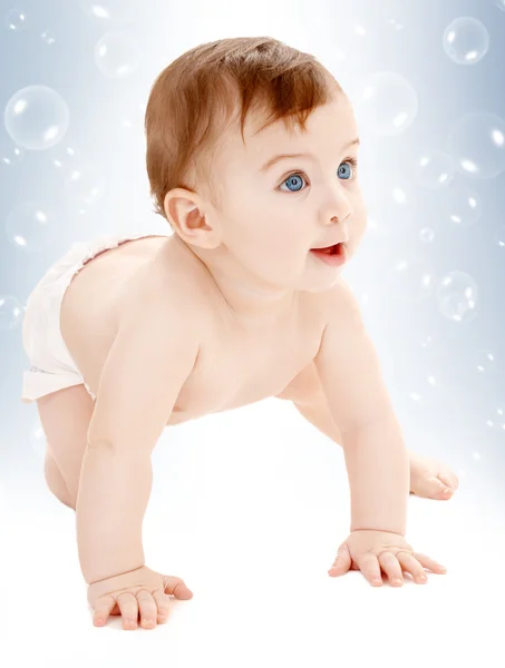 Crawling baby boy looking up — Stock Photo, Image