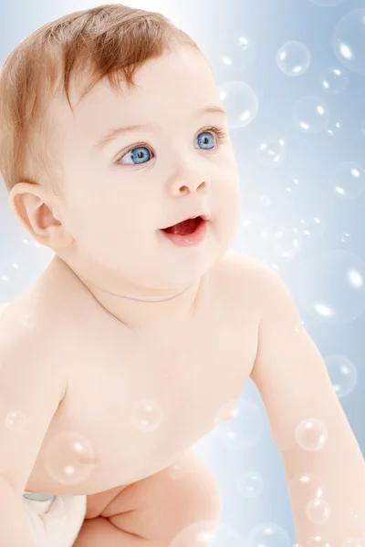 Crawling baby boy looking up — Stock Photo, Image