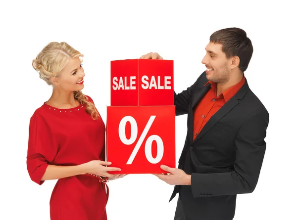 Man and woman with percent sign — Stock Photo, Image