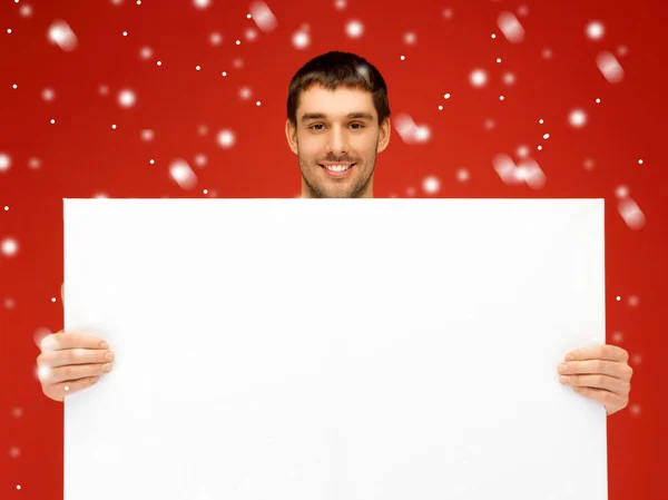 Homem bonito com grande placa em branco — Fotografia de Stock