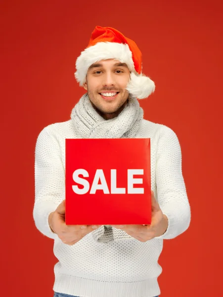 Handsome man in christmas hat — Stock Photo, Image