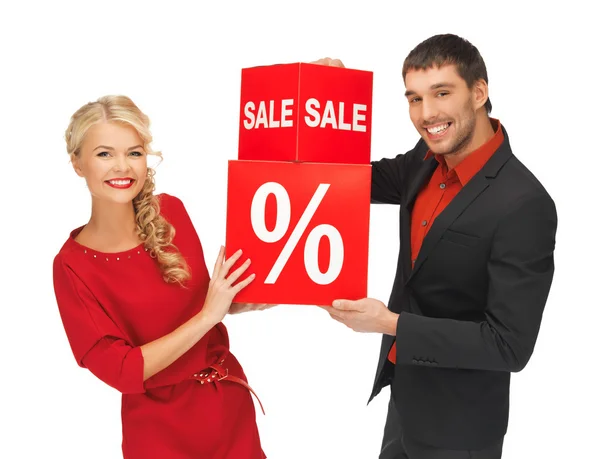 Man and woman with percent sign — Stock Photo, Image