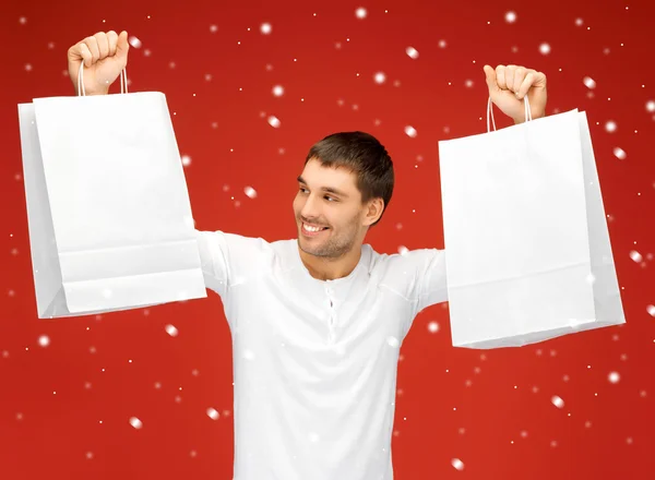 Homme avec des sacs à provisions — Photo