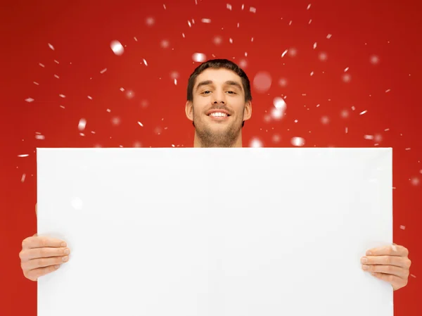 Hombre guapo con gran tablero en blanco — Foto de Stock