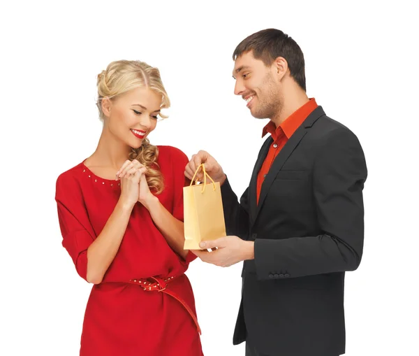 Man and woman with present — Stock Photo, Image