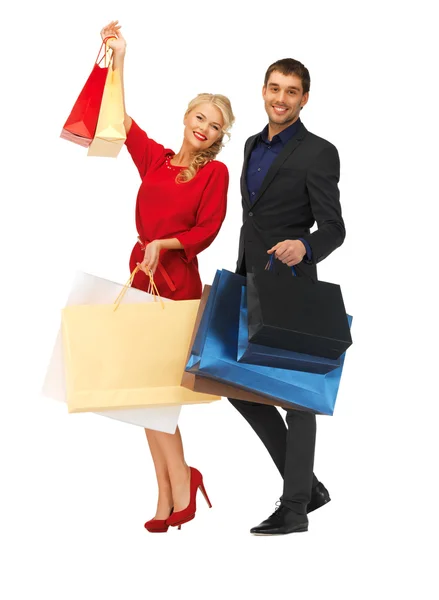 Mann und Frau mit Einkaufstüten — Stockfoto