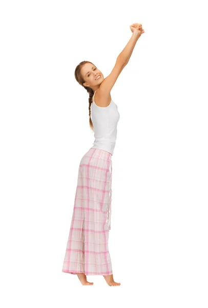 Woman in pajamas doing morning exercise — Stock Photo, Image