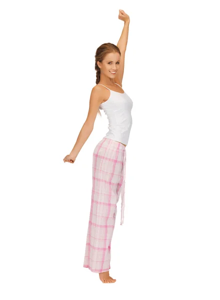 Woman in pajamas doing morning exercise — Stock Photo, Image