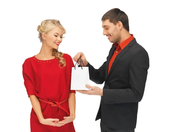 Man and woman with present — Stock Photo, Image