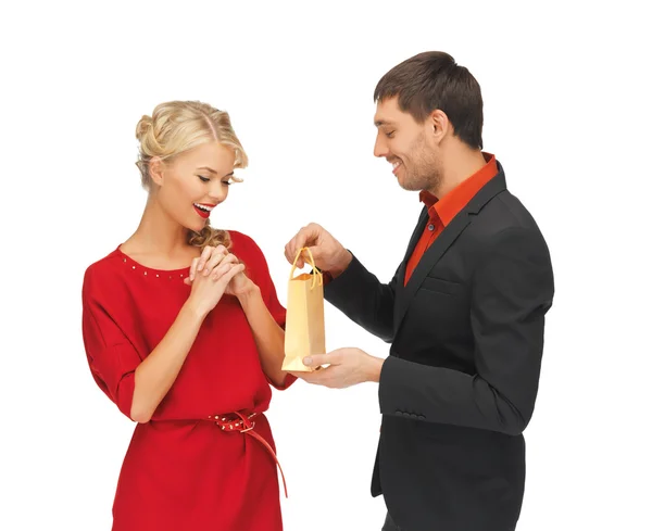 Man and woman with present — Stock Photo, Image