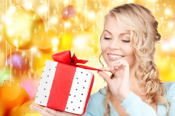 Happy woman with gift box Royalty Free Stock Photos