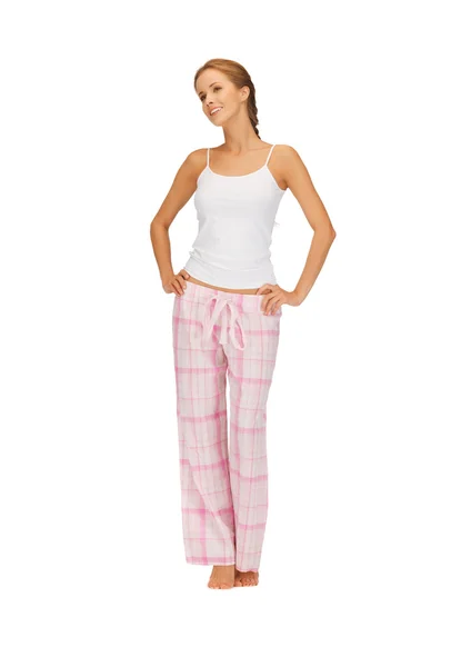 Glad och leende kvinna i bomull pyjamas — Stockfoto