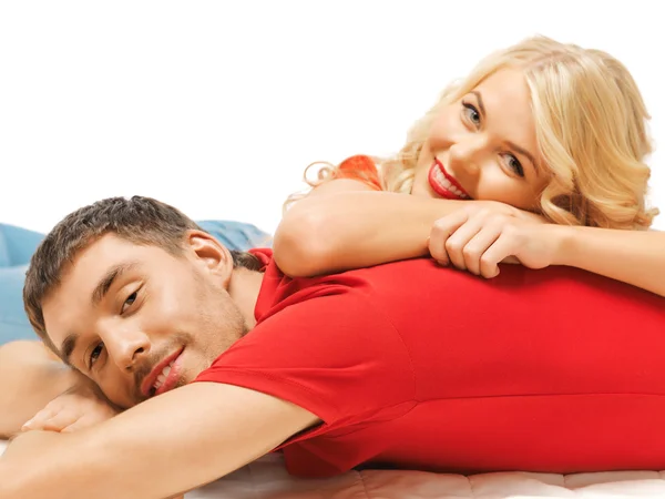 Happy couple lying at home — Stock Photo, Image