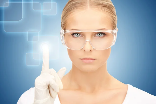 Woman working with virtual screen — Stock Photo, Image