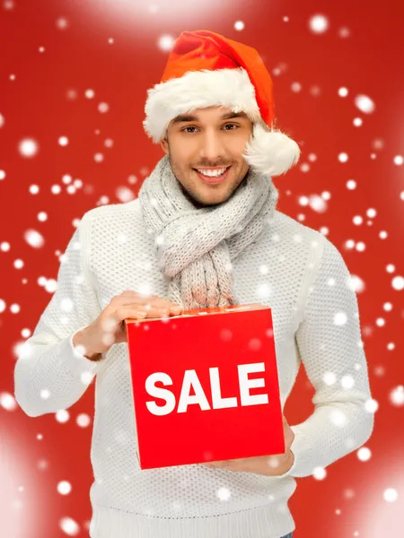 Handsome man in christmas hat — Stock Photo, Image