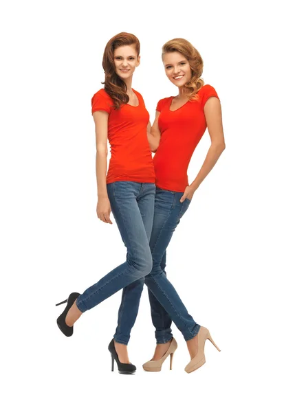 Two beautiful teenage girls in red t-shirts — Stock Photo, Image