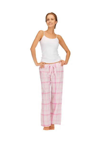 Happy and smiling woman in cotton pajamas — Stock Photo, Image