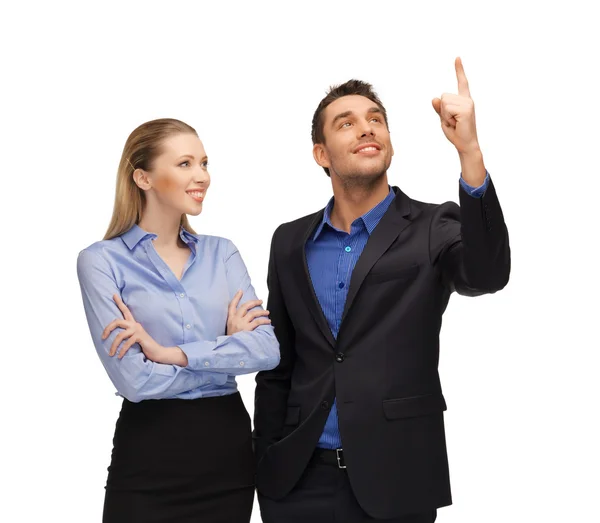 Man and woman pointing their fingers — Stock Photo, Image