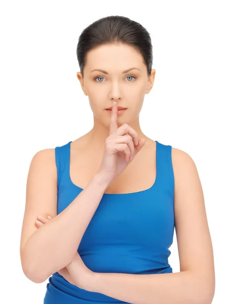 Mulher fazendo um gesto de silêncio — Fotografia de Stock