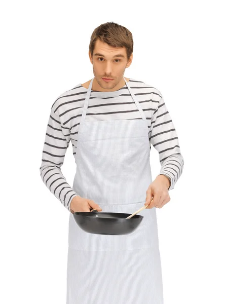 Handsome man with pan and spoon — Stock Photo, Image