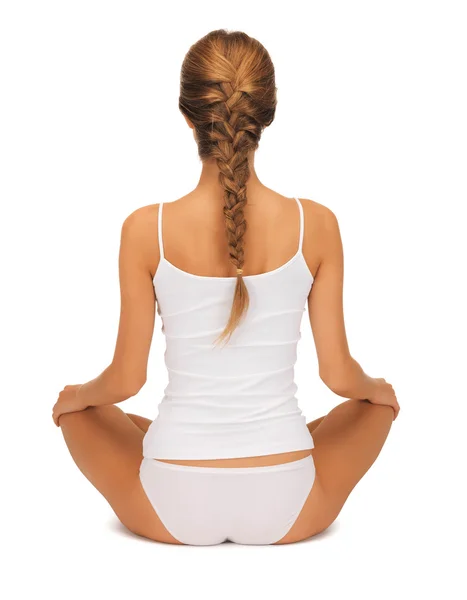 Mulher em undrewear praticando ioga postura de lótus — Fotografia de Stock